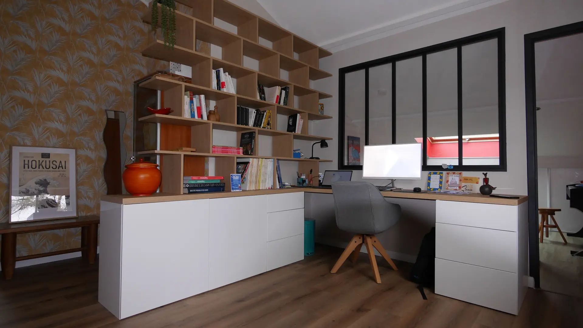 Custom corner desk with integrated bookshelf