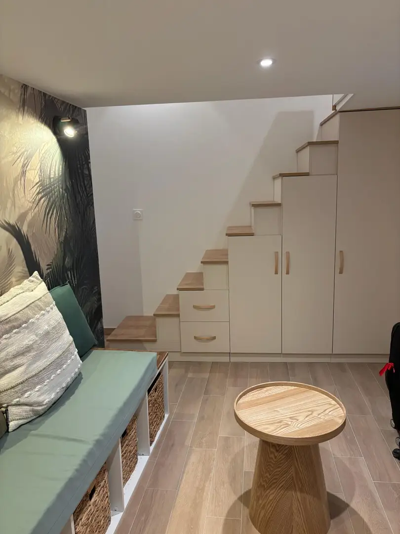 Custom staircase furniture with integrated wardrobe and storage