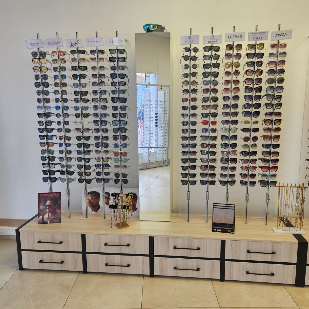 Custom-made multi-unit furniture set for opticians with drawers