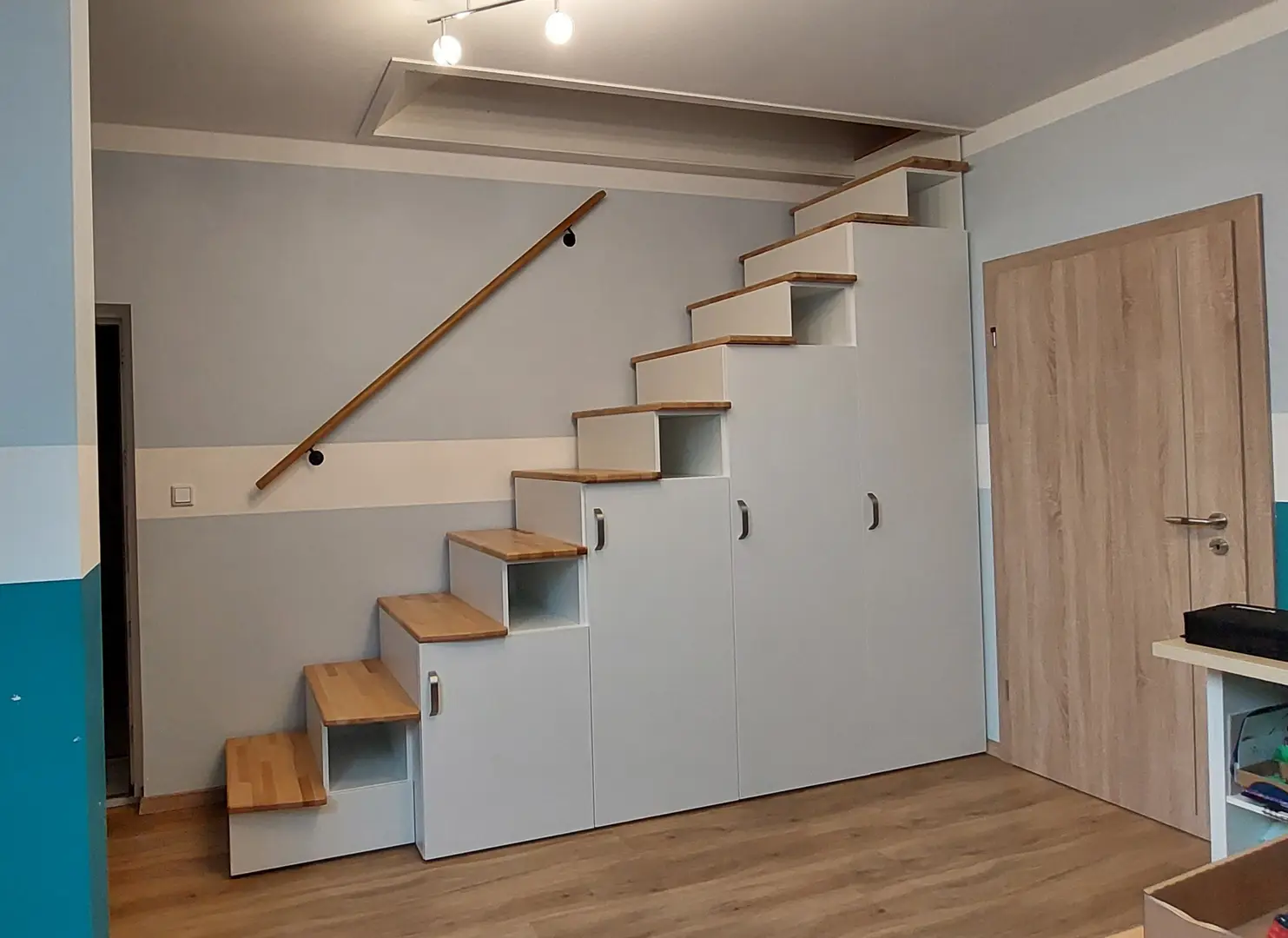 Custom stair storage unit with wardrobe
